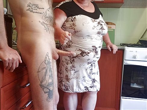 my mother-in-law saw my cock and began to milk it until I finished